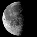 The Moon is shown with its left half lit up.