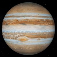 A photo of the planet Jupiter from space. It has many tan, brown, and white lines and swirls across it. It has a large, red spot.