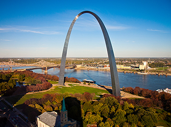a big piece of metal that arches or curves upward, like a hill you can walk under
